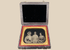 Quarter-plate Victorian ambrotype depicting three female sitters in period dress