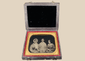 Quarter-plate Victorian ambrotype depicting three female sitters in period dress
