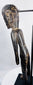 Full-length Rapa Nui-inspired skeletal wooden sculpture with carved hands, legs and feet