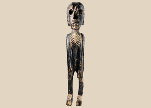 Rapa Nui-inspired moai kavakava hand-carved wooden skeletal figure on display stand