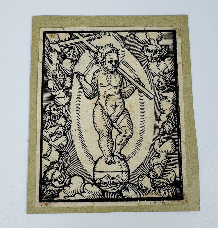 Antique German woodcut on laid paper depicting Salvator Mundi with celestial imagery and Renaissance hatching.