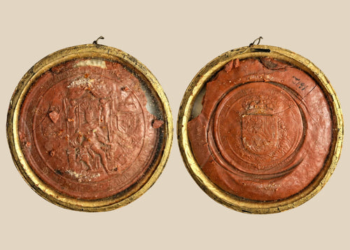 Red wax royal seal of King Philip IV of Spain, circular with detailed enthroned monarch design and Latin inscription, mounted on a white background.