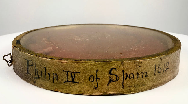Rare 17th-century Spanish monarchy wax seal featuring intricate royal imagery and preserved historical lettering.