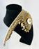Woven plant fiber ceremonial ornament from PNG with tooth fringe