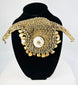 Late 19th-century PNG ritual ornament made of woven plant fiber and cowrie shell