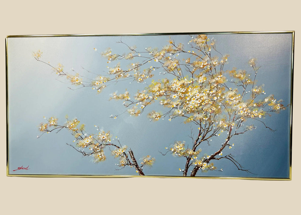 Original oil painting on canvas by Roland Patros, depicting a blossoming tree with delicate white and yellow flowers on twisting branches against a soft gradient blue background, mid–late 20th century.