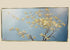 Original oil painting on canvas by Roland Patros, depicting a blossoming tree with delicate white and yellow flowers on twisting branches against a soft gradient blue background, mid–late 20th century.