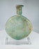 Roman free-blown glass perfume flask with iridescence and burial encrustation circa 1st–3rd century CE