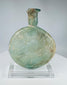 Roman free-blown glass perfume flask with iridescence and burial encrustation circa 1st–3rd century CE