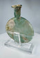 Ancient Roman pale green glass container with flared rim and custom display stand