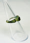 Historic Roman bronze ring relic photographed against neutral background