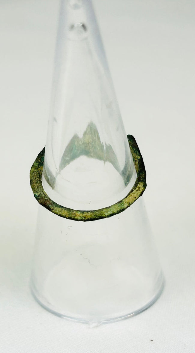 Back view of 2nd-century Roman bronze ring showing sculpted shoulders and gemstone clarity