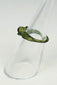 Archaeological Roman jewelry artifact displayed on museum-style black presentation stand