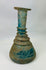 Museum-quality Roman glass unguentarium with flared rim and elongated neck