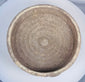 Broad Roman pottery bowl from ancient Tunisia showing weathered earthenware surface and centuries of natural mineralization.