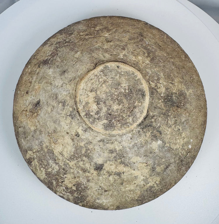 Roman Imperial terracotta household bowl excavated from North Africa displaying original white slip and burial patina.
