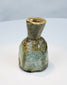Roman glass cosmetic or medicinal vessel with pale blue-green colouring