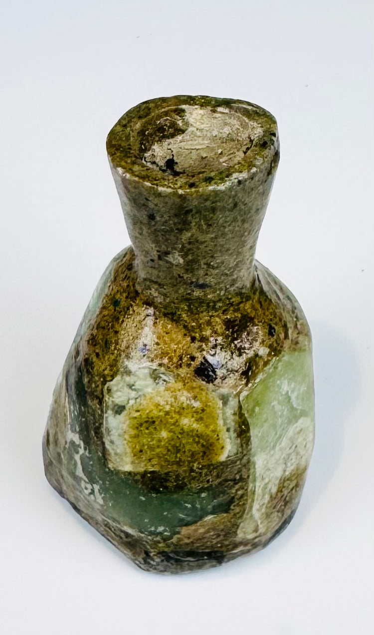 Small Roman Imperial glass perfume bottle dating to the 1st–3rd century CE