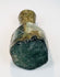 Ancient Roman miniature flask, circa 1st–3rd century CE, with iridescent weathering