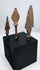 Three European iron weapon points in elongated, leaf-shaped, and triangular forms