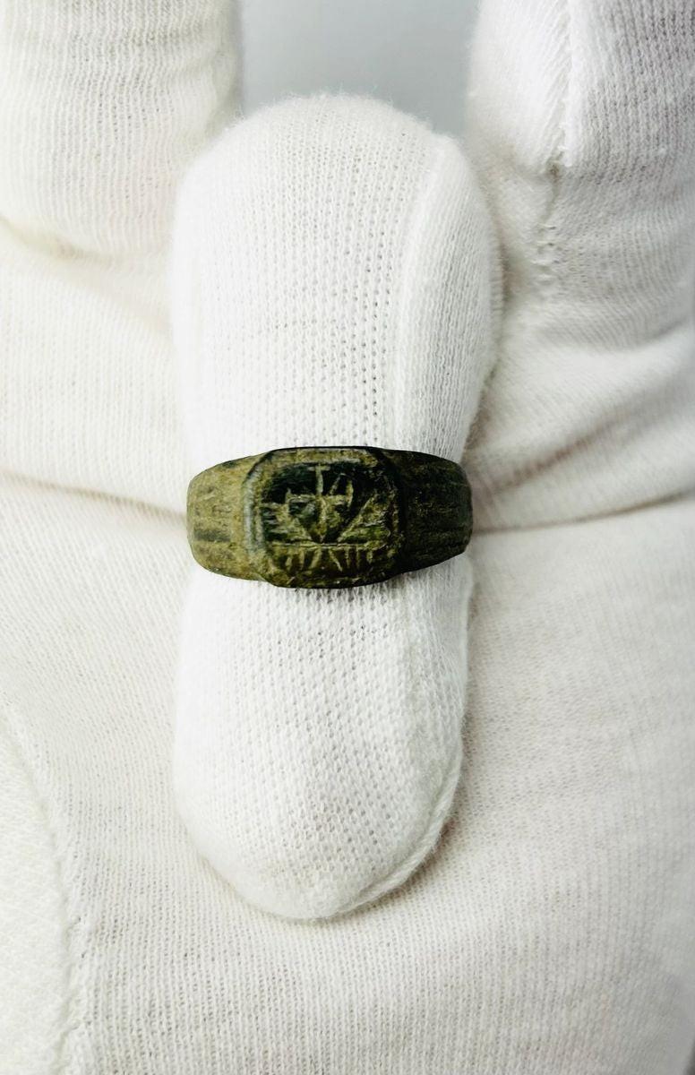 Roman ring engraved with Chi-Rho Christogram, early Christian symbol, bronze or base metal, 1st–4th century CE, showing fine Roman craftsmanship and preserved patina.