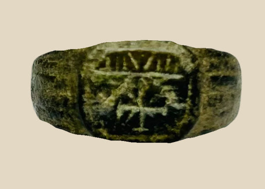 Roman ring engraved with Chi-Rho Christogram, early Christian symbol, bronze or base metal, 1st–4th century CE, showing fine Roman craftsmanship and preserved patina.
