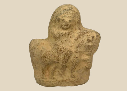 Terracotta figurine from Roman Egypt, 1st–3rd century CE, depicting a horse with strong proportions and a rider in a commanding pose, blending Roman and Egyptian artistic traditions.