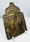 Cast bronze Russian Orthodox icon panel with geometric borders, religious figures, and aged dark patina.