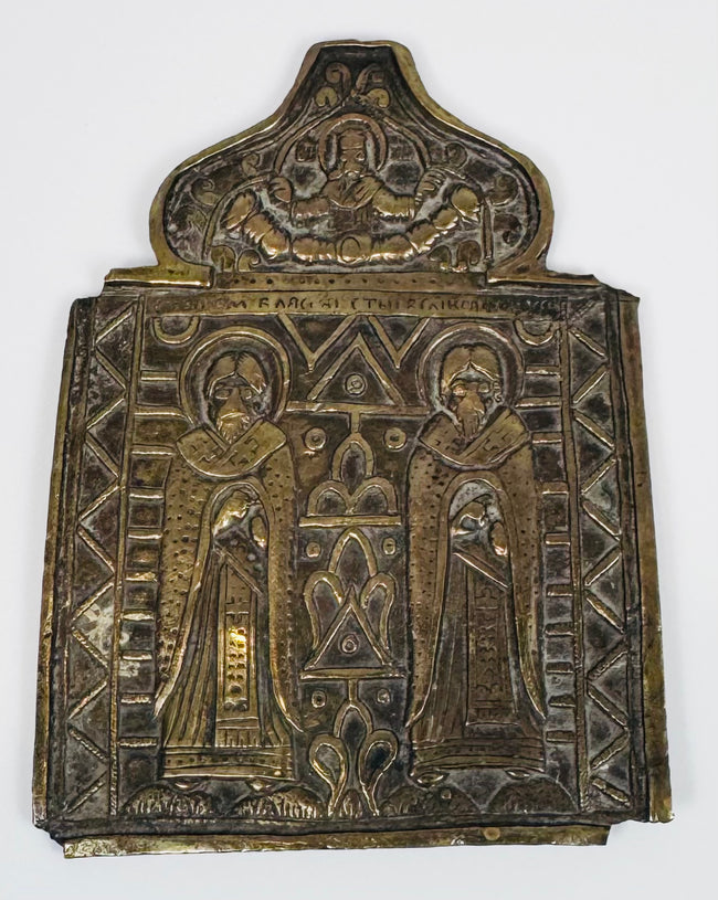 Antique Russian Empire cast bronze icon featuring Saints Blaise and Athanasius with architectural ornamentation and dark patina.