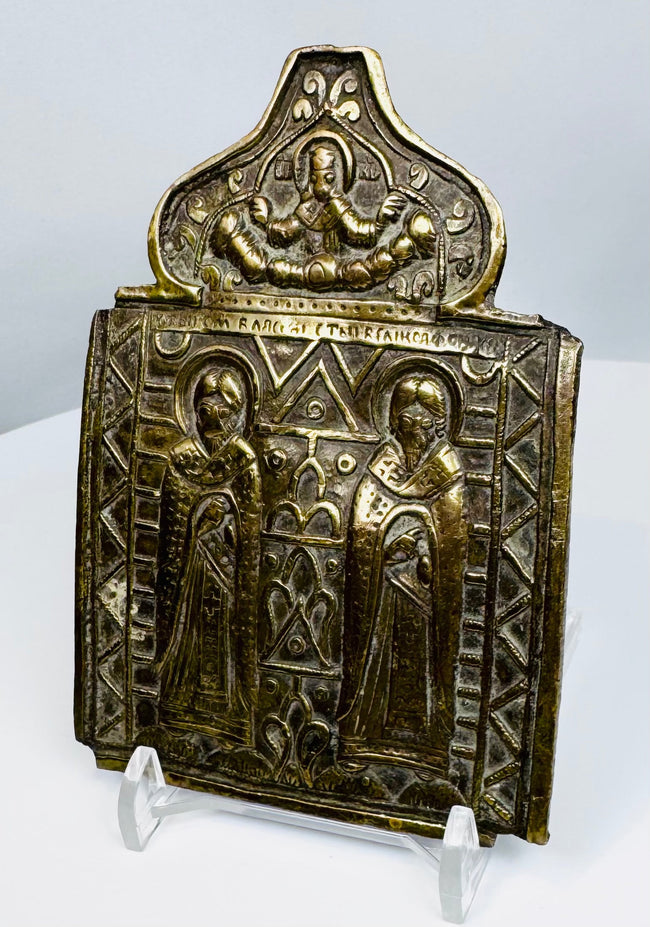 Russian Orthodox travel icon in cast bronze showing Saints Blaise and Athanasius with Church Slavonic inscriptions.