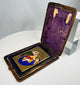 Polychrome enamel Madonna and Child icon with ornate border