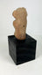 Late Classic Veracruz terracotta female figure with pierced back for suspension
