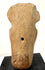 Back view of antique Veracruz terracotta figurine showing circular vent hole