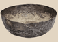 Medieval Seljuk silver unguent bowl from Persia dating to the 12th–13th century, featuring finely engraved floral and geometric decoration.
