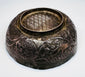 Seljuk-period silver unguent bowl displaying engraved decoration, aged silver surfaces, and a compact 2.5-inch diameter form.
