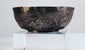 Small Persian silver bowl from the Seljuk period, traditionally associated with storing precious oils, ointments, or perfumes.