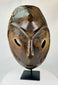 Close-up of carved eyes and nose on a Sepik River wooden mask