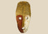 Papua New Guinea Sepik River tribal mask, hand-carved hardwood with red ochre and lime pigments, dual-colored face, circa 1900–1940.