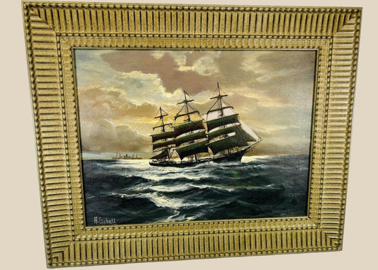 Signed oil on canvas board painting titled “Ships That Pass In The Night” by Alfred Gabali (1886–1963), circa 1958. Maritime scene depicting ships at sea with expressive brushwork and refined ocean and sky tones. Dedicated on verso to Carol Anne Kahne. Reflects Gabali’s German heritage, seafaring background, and Cape Cod art community influence.