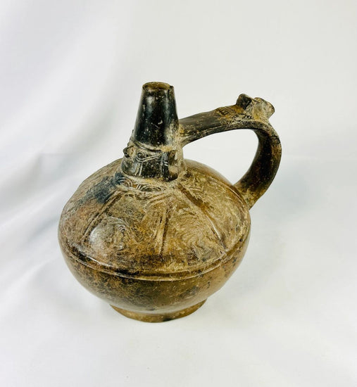 Small Sicán blackware ceramic bottle from Lambayeque Valley, Peru, 5.5 x 6 inches, burnished surface with elegant form, ritual and ceremonial artifact from 750–1375 A.D.