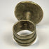 Antique Victorian-style ring featuring a circular rosette bezel and preserved relief details