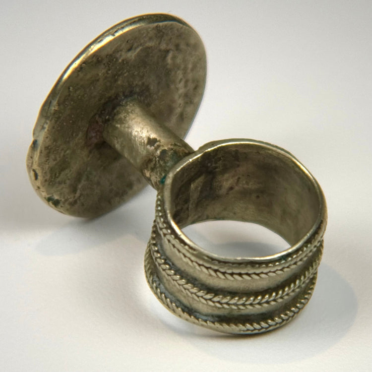 Antique floral ring with rosette centerpiece, beaded border, and naturally oxidized recesses