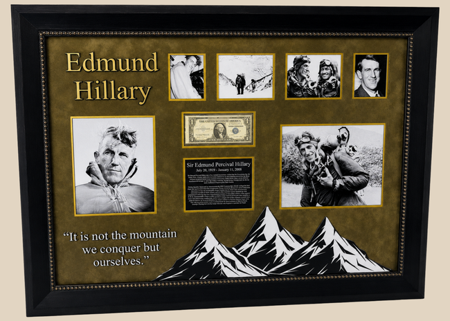 Framed display of Sir Edmund Hillary’s authentic signature on a US $1 banknote, professionally mounted with archival backing and glass, including photographic and illustrative elements commemorating his Everest ascent.
