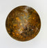 Early artillery iron shot featuring corroded surface, rust tones, and historic character