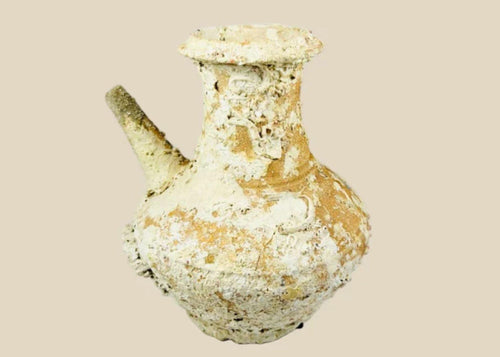 Song Dynasty Chinese terracotta wine pot with marine encrustations, recovered from a shipwreck near Balabac Island, featuring a wide mouth, rounded body, and slender spout, reflecting ancient maritime trade and centuries underwater.