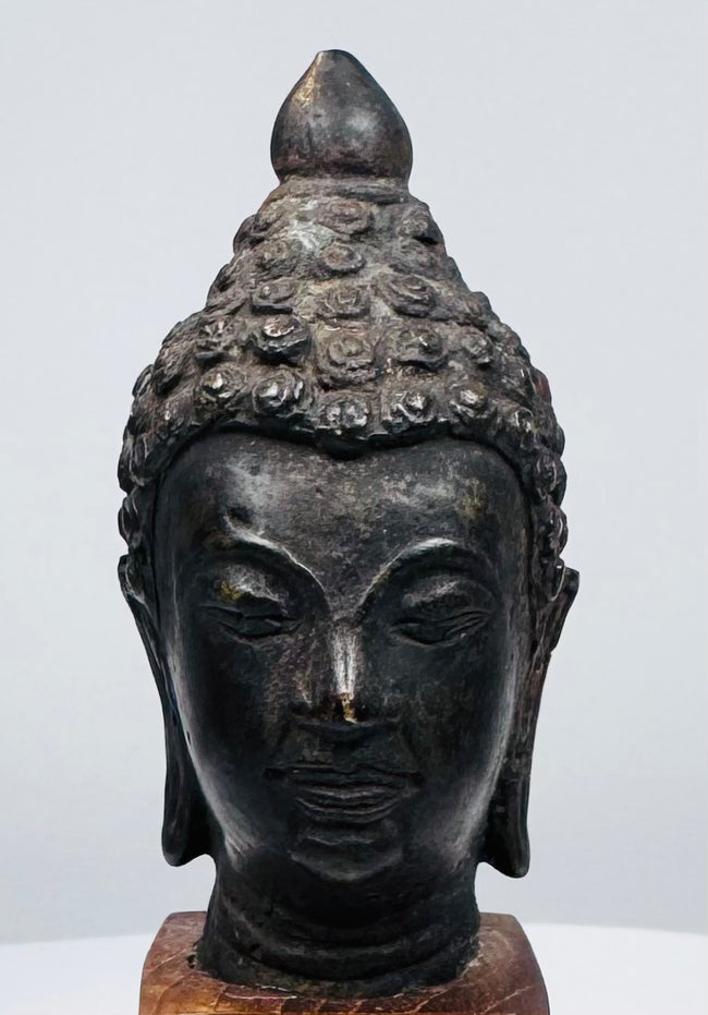 18th–19th century Southeast Asian cast bronze Buddha head with dark natural patina