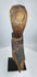 Southeast Asian spiritual hardwood carving mounted on a metal stand with aged patina