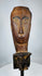 Southeast Asian tribal wooden ceremonial figure fragment mounted on a custom display stand