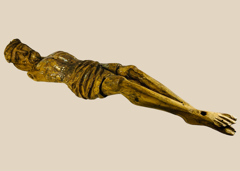 17th-century Spanish Colonial carved wooden devotional figure with traces of original polychrome and aged patina