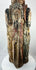 Spanish Colonial religious wood carving with four haloed saints in arched niches.